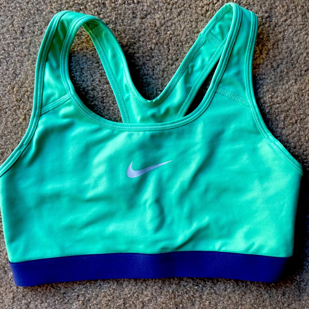 Mint green and purple Nike sports bra